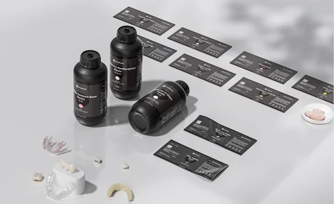 Dental resin bottles and printed samples in the PioCreat open resin library