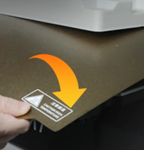 Hand bending a removable G5Ultra build plate to release a print