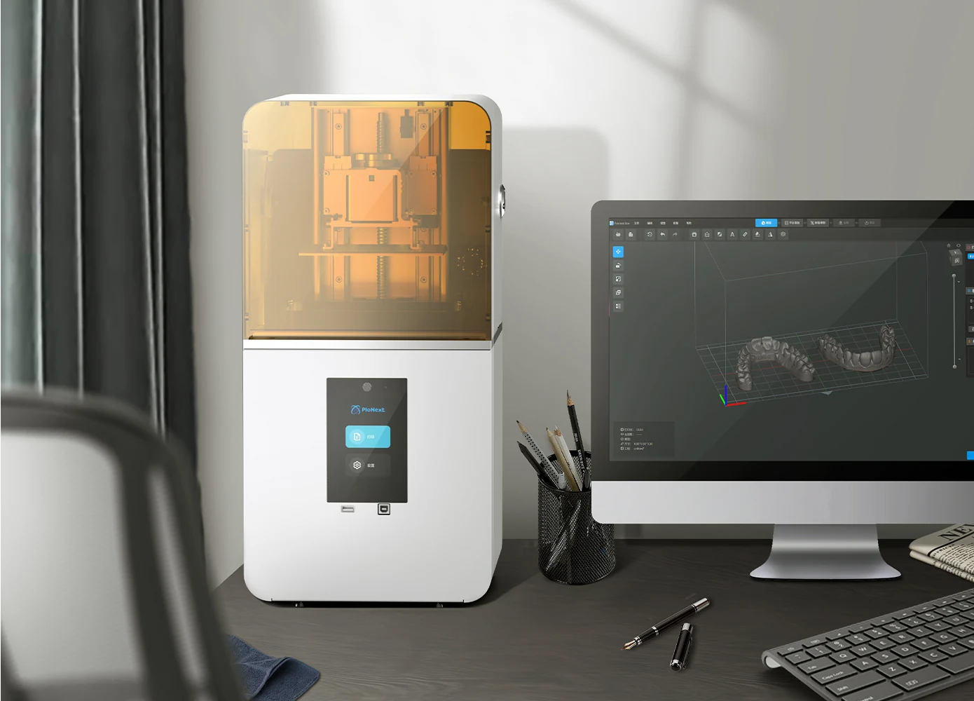 D160 dental 3D printer beside a computer running dental software
