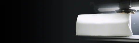 MS01 printing a white orthotic form inside its enclosed chamber
