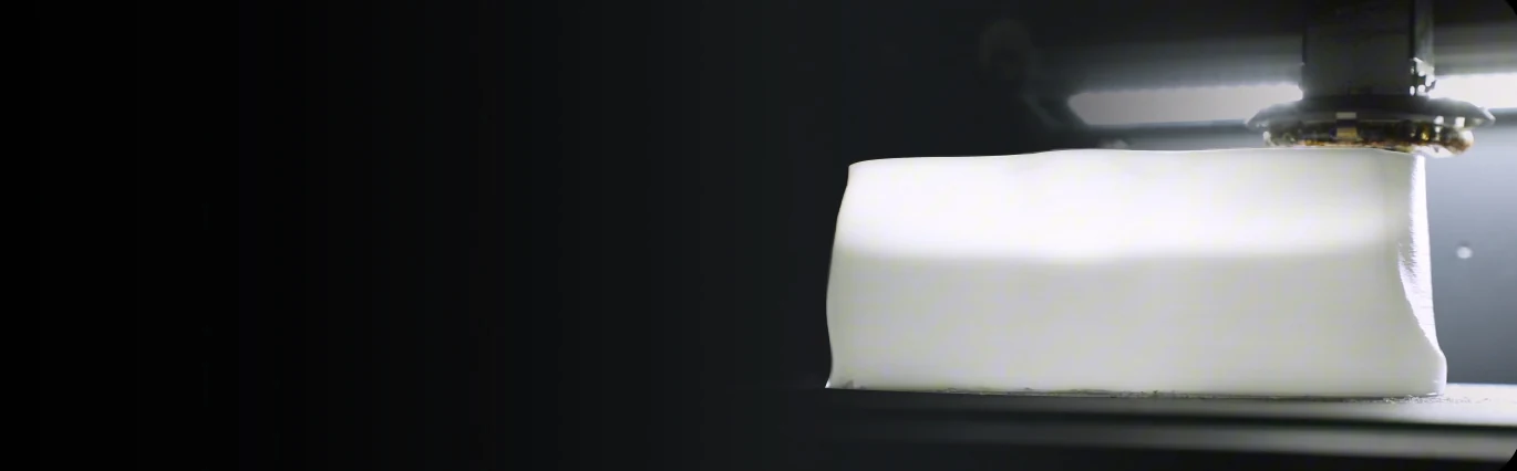 MS01 SE extruding a white orthotic form on the build plate