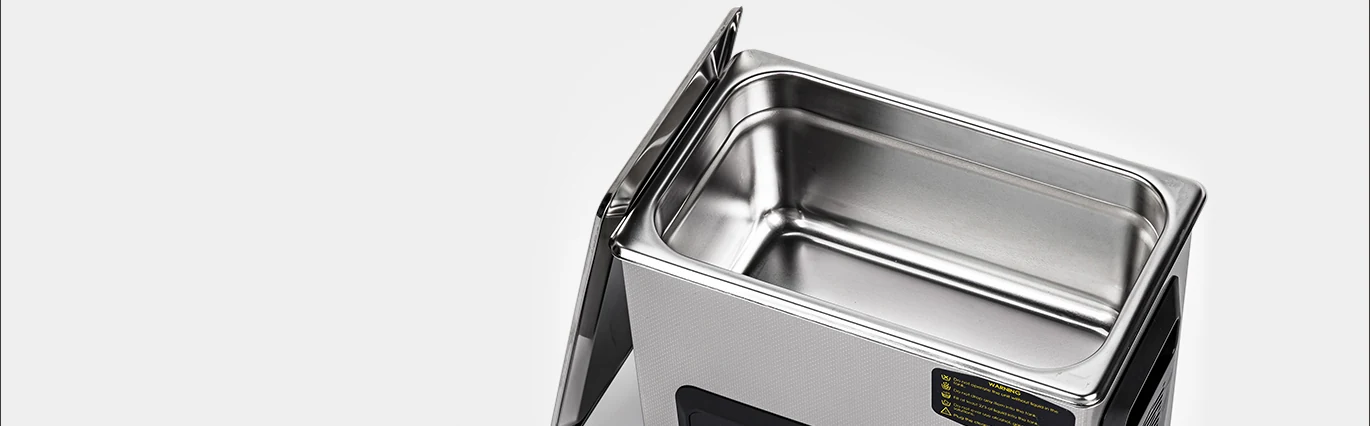 Stainless steel cleaning tank inside the CD-X3 ultrasonic cleaner