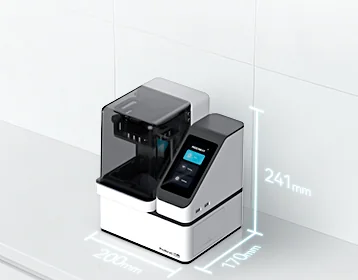 Compact PioNext Mini dental 3D printer on a clinical worktop